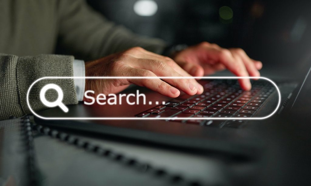 A man enters text into a search engine hoping SEO blogs written by AI will be user-friendly