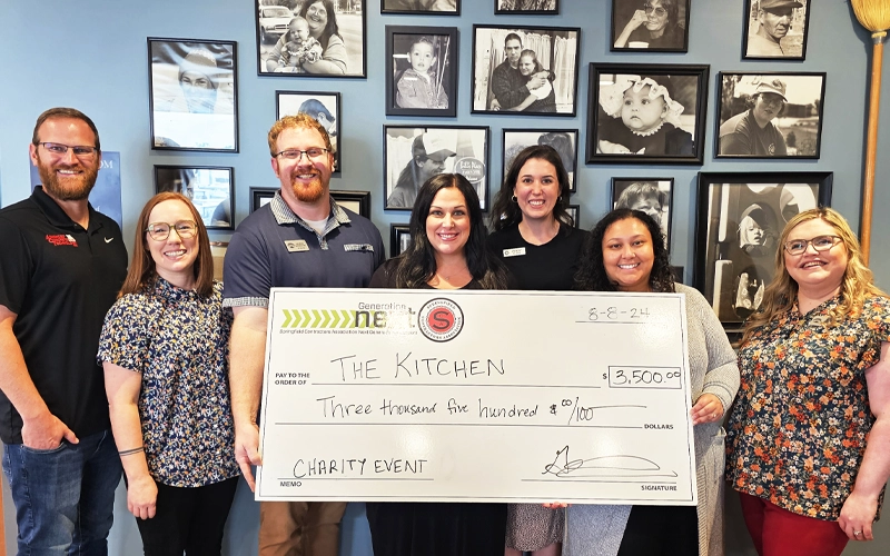 SCA Charity event with a check to The Kitchen