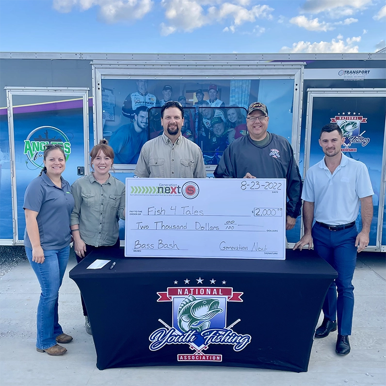 Presentation of check at the Generation Next event call Bass Bash